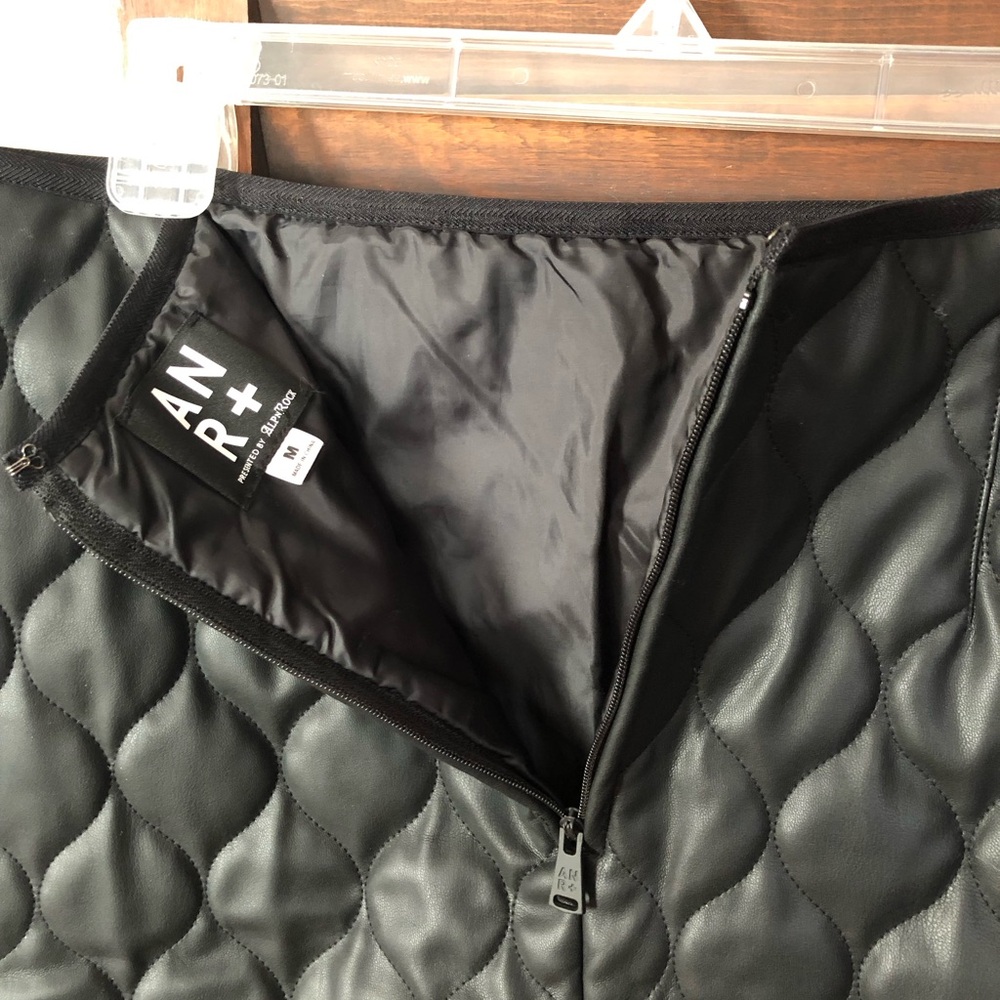 Black “ALP n Rock” skirt new w/o tags.